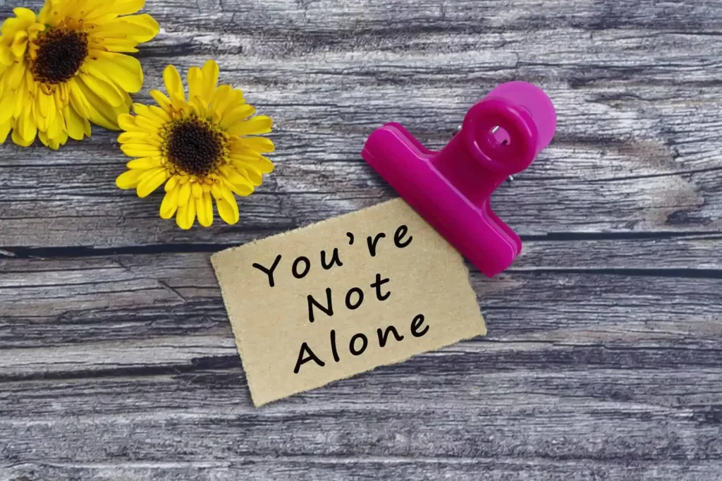 “You’re Not Alone” image illustrating ways to find help and support for mental health