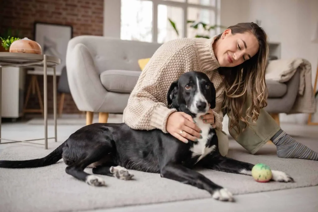 Woman with her dog, illustrating companionship and strategies for managing loneliness effectively