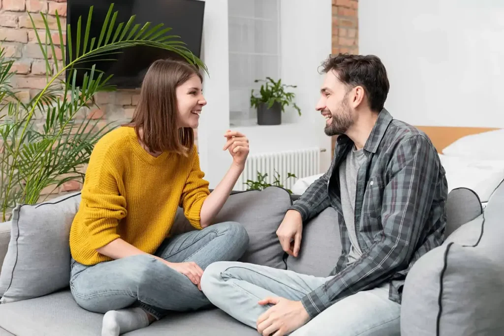 Image of two people talking for article on how to manage and deal with gossip