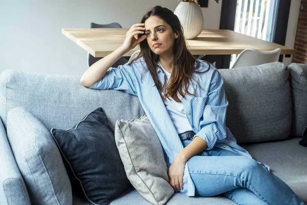 Depressed woman image illustrating ways to manage persistent fears and anxiety effectively.