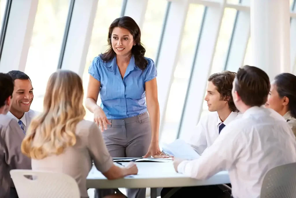 Girl talking to others, illustrating tips for overcoming the fear of public speaking effectively