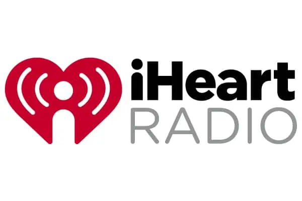 iHeartRadio logo on Stan Popovich’s website representing his media interviews and features